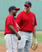 Mark Teixeira has a laugh with Chone Figgins.jpg