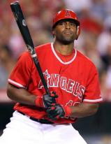 Torii Hunter looks on with the bat.jpg