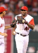Torii Hunter is congratulated by Juan Riviera.jpg