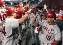 Angels teammates congratulate Mike Napoli.jpg