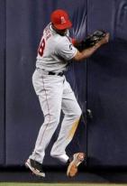 Torii Hunter loses his shoe as he goes into the outfield wall.JPG