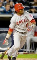 Erick Aybar hits a single during the 2009 NLCS vs the Yankees.JPG