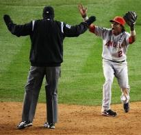 Erick Aybar argues with the second base umpire.JPG
