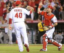 Brian Fuentes gets congratulations from Mike Napoli.JPG