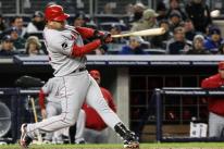 Kendry Morales hammers a RBI single against the Yankees.JPG