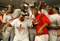 angels team celebrate 2007 playoff clinching win in clubhouse.jpg