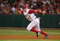 Reggie Willits takes off from first base.jpg
