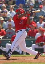 Torii Hunter power swing follow through.jpg