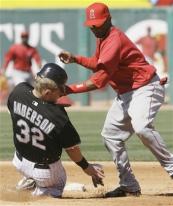 Erick Aybar tags out Brian Anderson at second base.jpg
