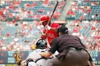 Aybar looks at a pitch low and away.jpg