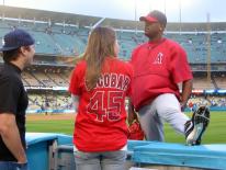 Kelvim Escobar chats with fans as he stretches.jpg