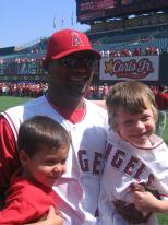 Escobar takes a photo with two little Angels fans.jpg