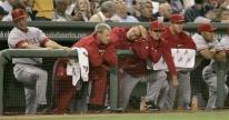 team looks on from dugout capt. .angels_red_sox_baseball_bxs131.jpg
