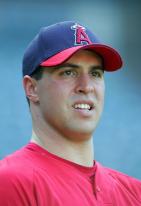 Mark Teixeira looks on in an Angels cap and uniform.jpg